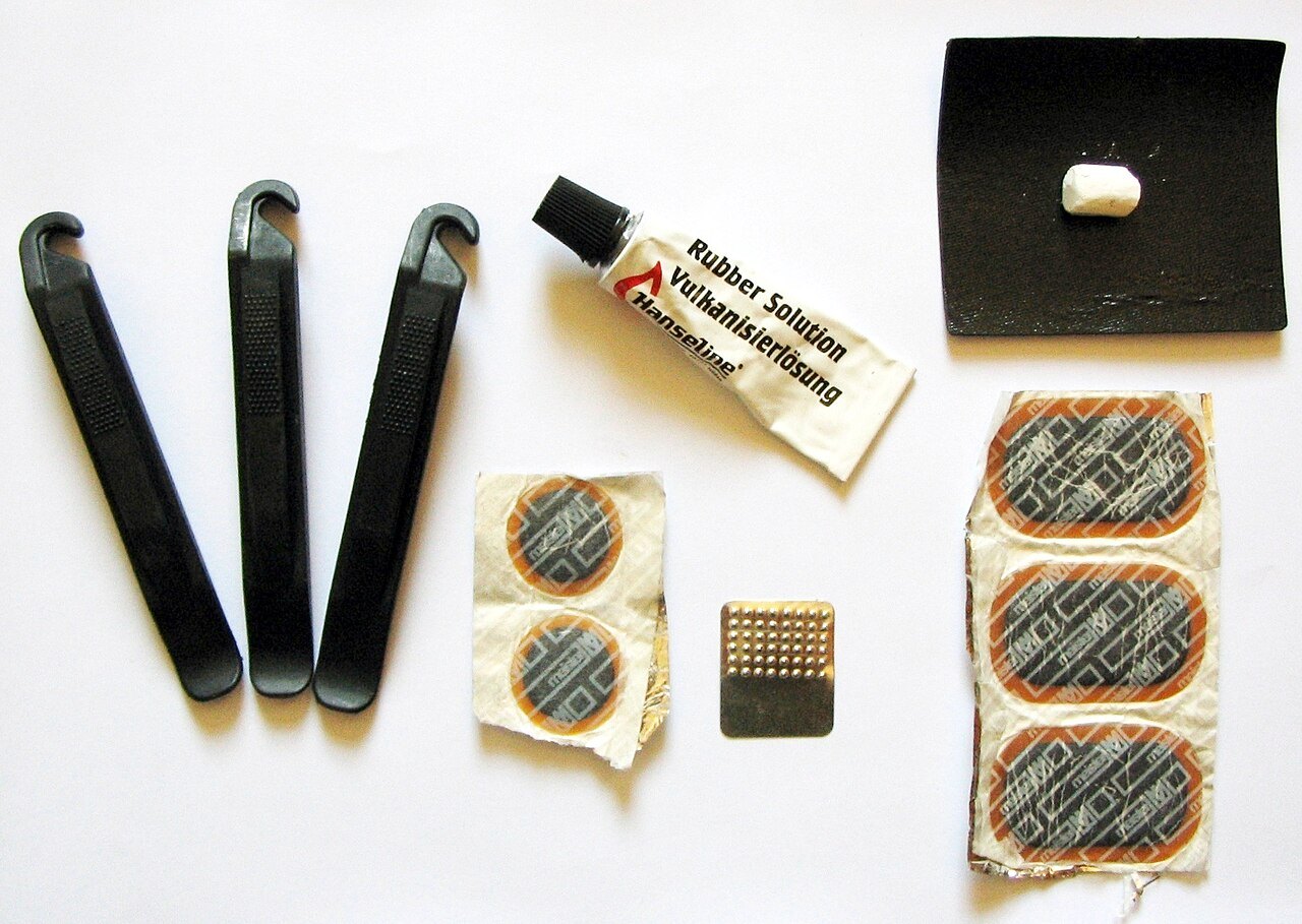 Patches, glue and tyre levers for repairing an inner tube.