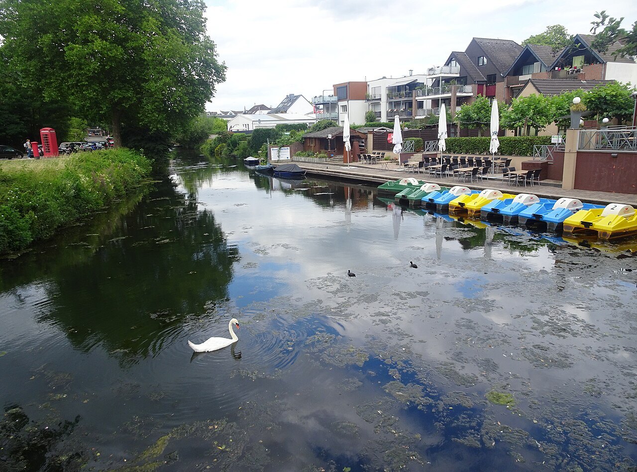 Water, reflections and the bank line at Worcester Bridge in Kleve.